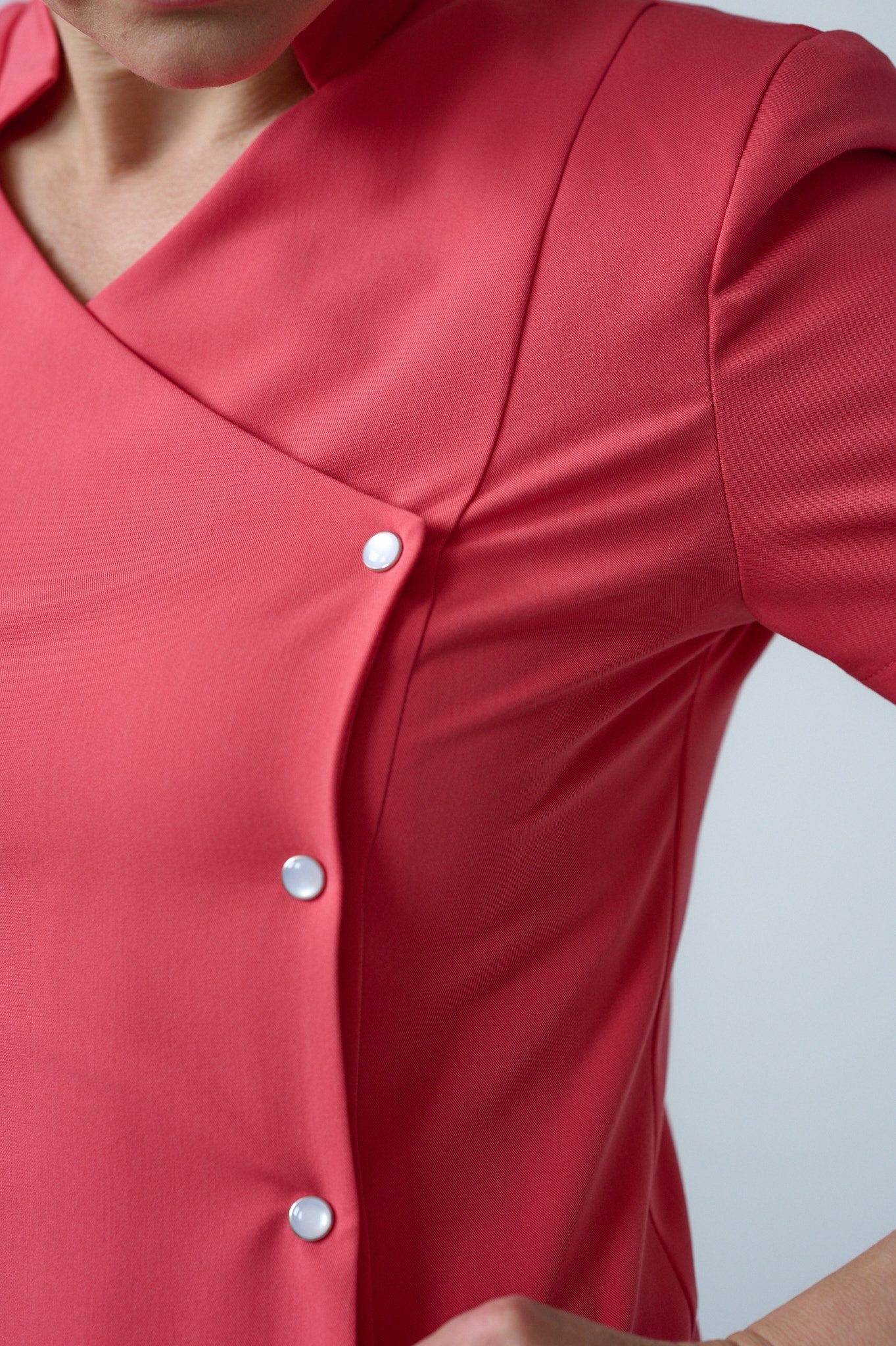 PINK ROBE BUTTONED ON THE SIDE